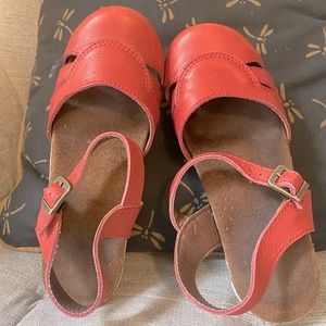 Sanita clogs. New, reddish - burnt red